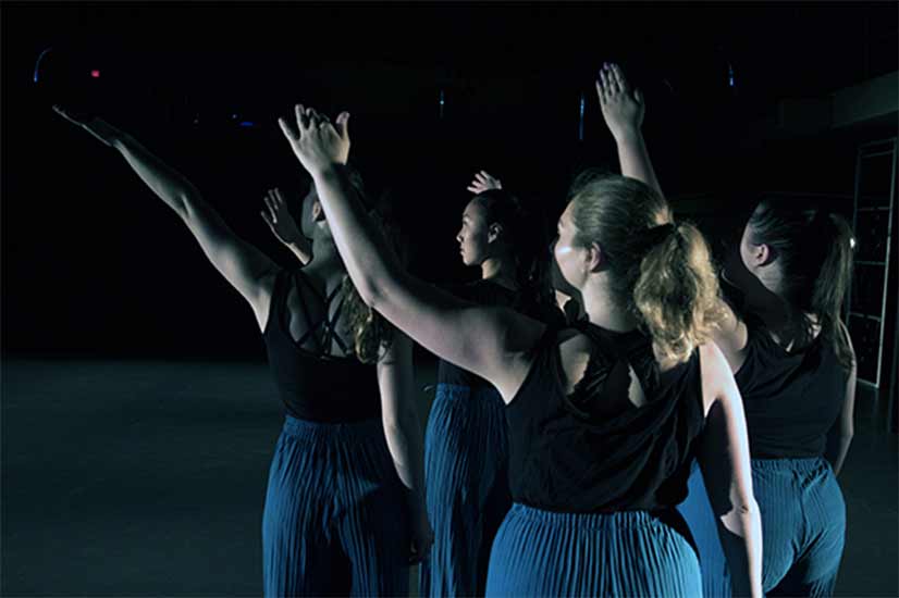 Oxford students present a dance performance.