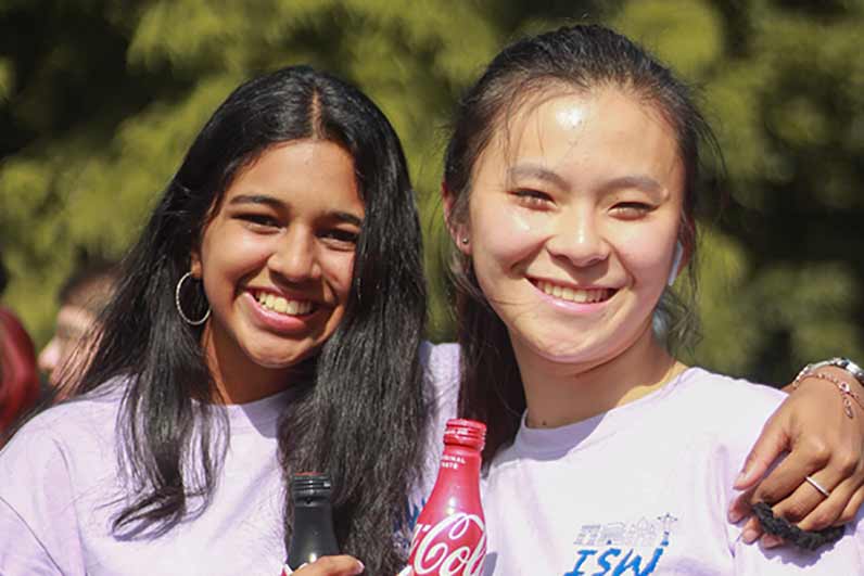 iMentors celebrate Oxford's Coke toast.