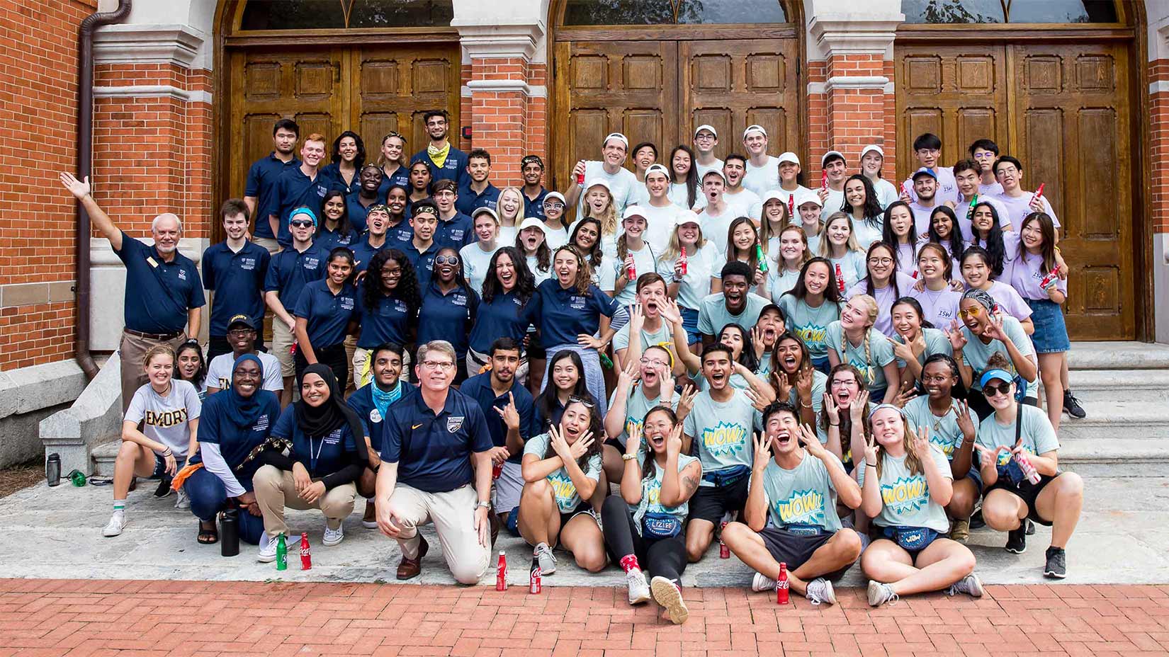 Student leaders gather during orientation on the steps of Seney Hall.
