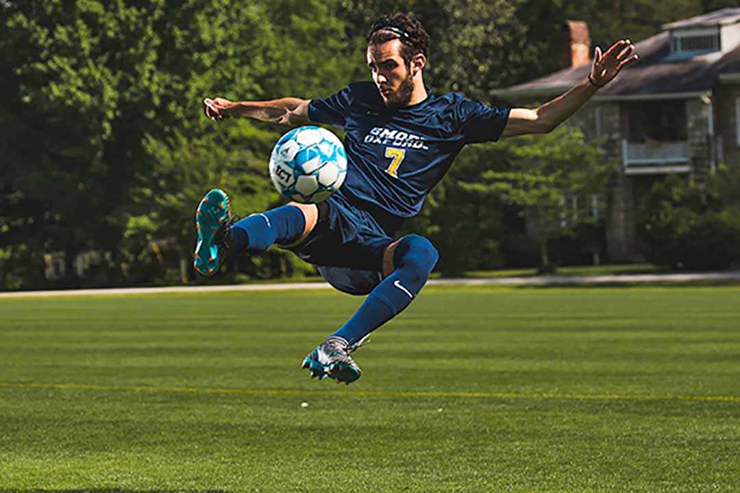 An Oxford soccer player shows off some moves on the field.