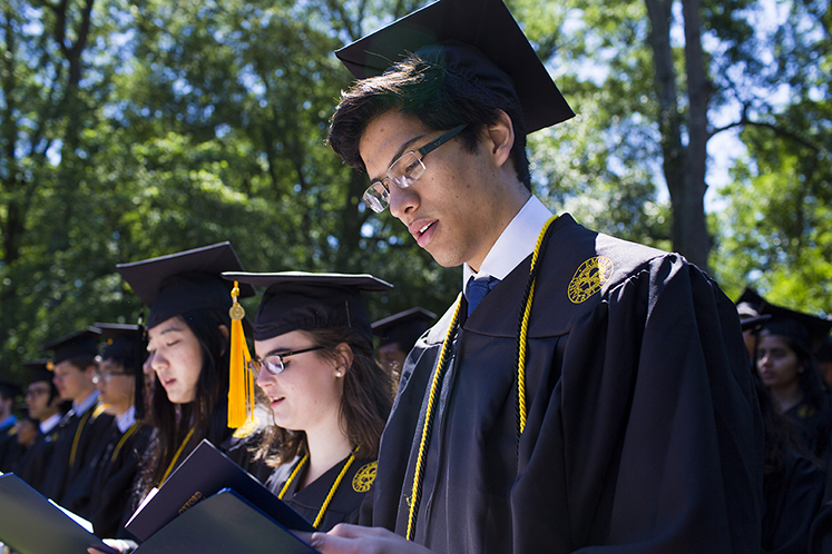 Oxford students take part in commencement ceremonies on the Oxford quad. 