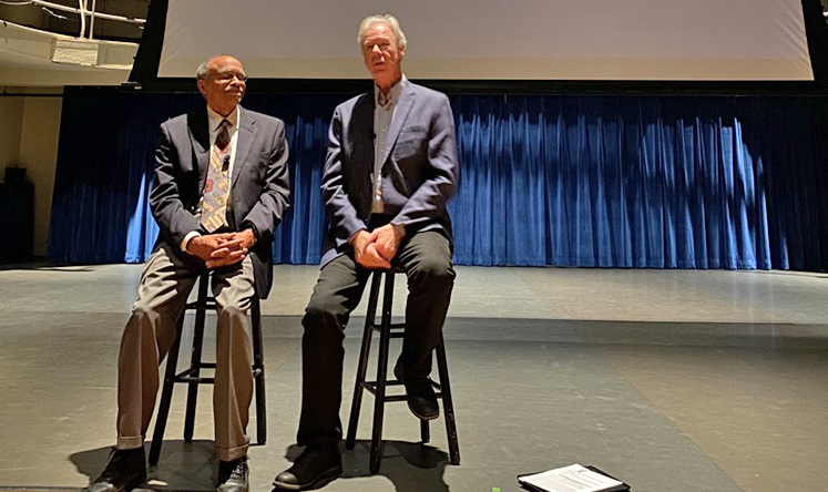 Left, Luther E. Smith Jr., Emory Candler School of Theology Professor Emeritus of Church and Community, and filmmaker Martin Doblmeier talk about the film 'Backs Against the Wall: The Howard Thurman Story' after the screening at Williams Hall.