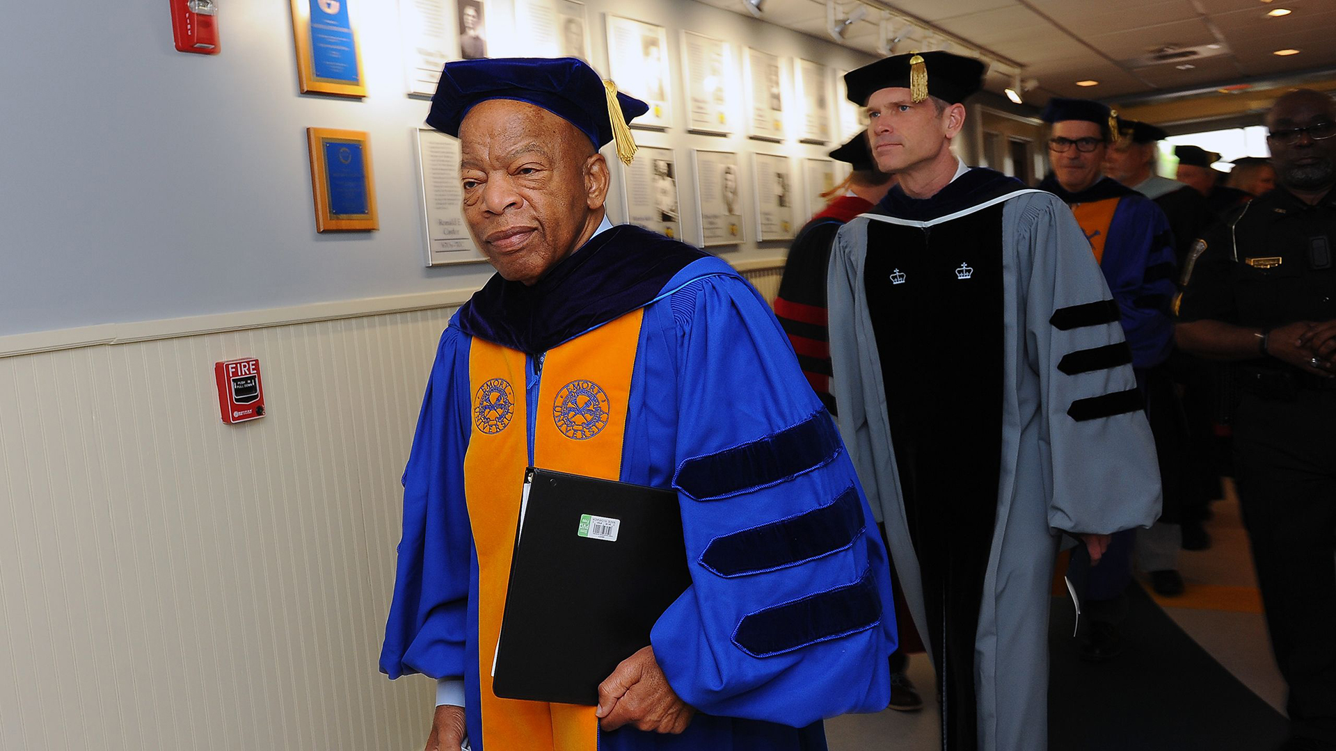 U.S. Rep. John Lewis walks toward the gym for Oxford's Commencement.