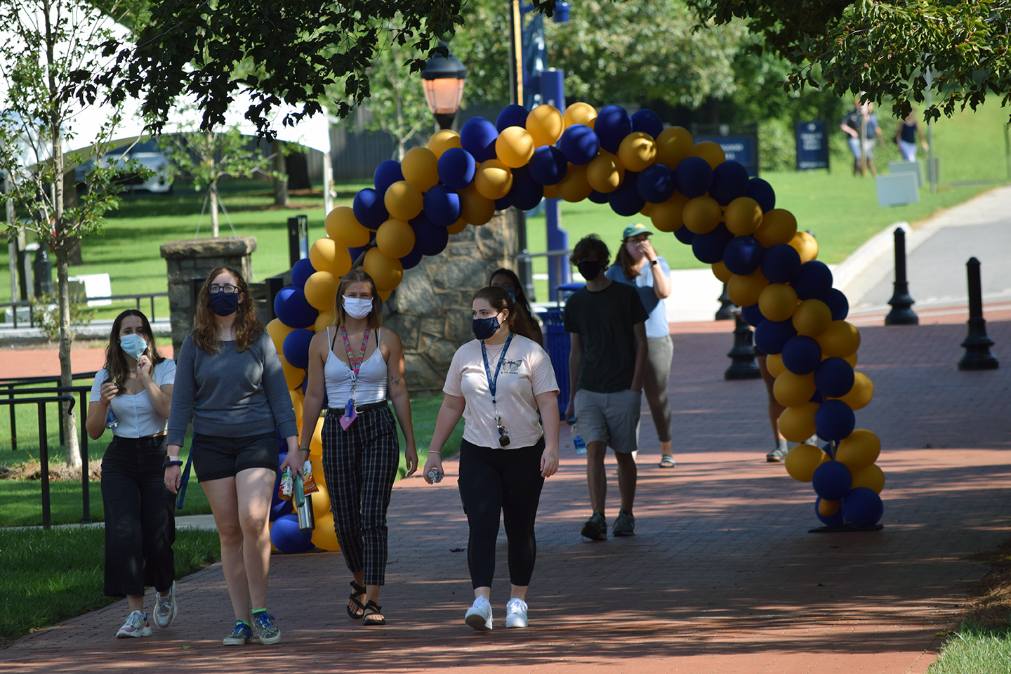 Students walk outside the student center