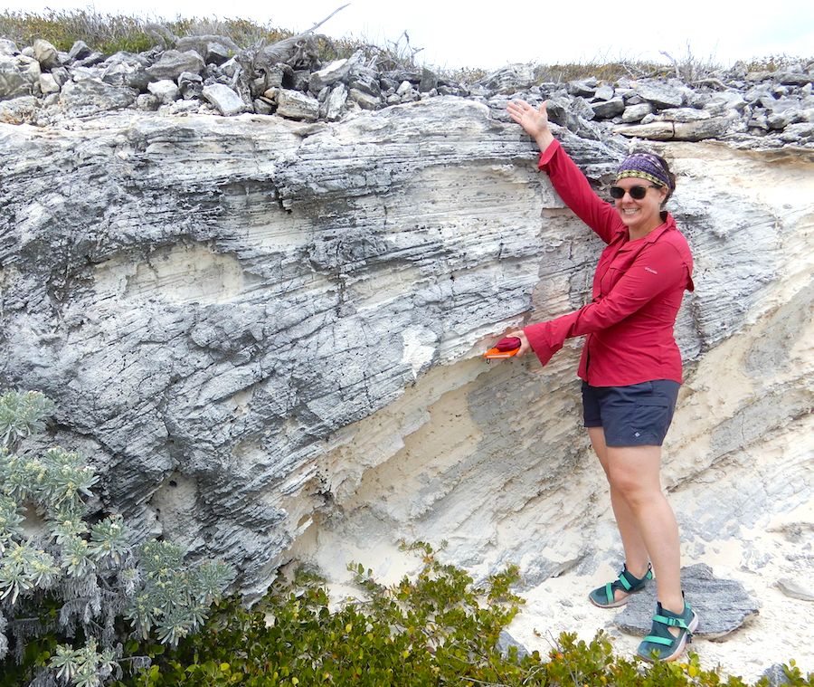 Melissa Hage examines cross bedding of a former sand dune on San Salvador. 