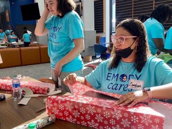 Volunteers packed boxes for children in Newton County foster care as part of this year's Emory Cares day.