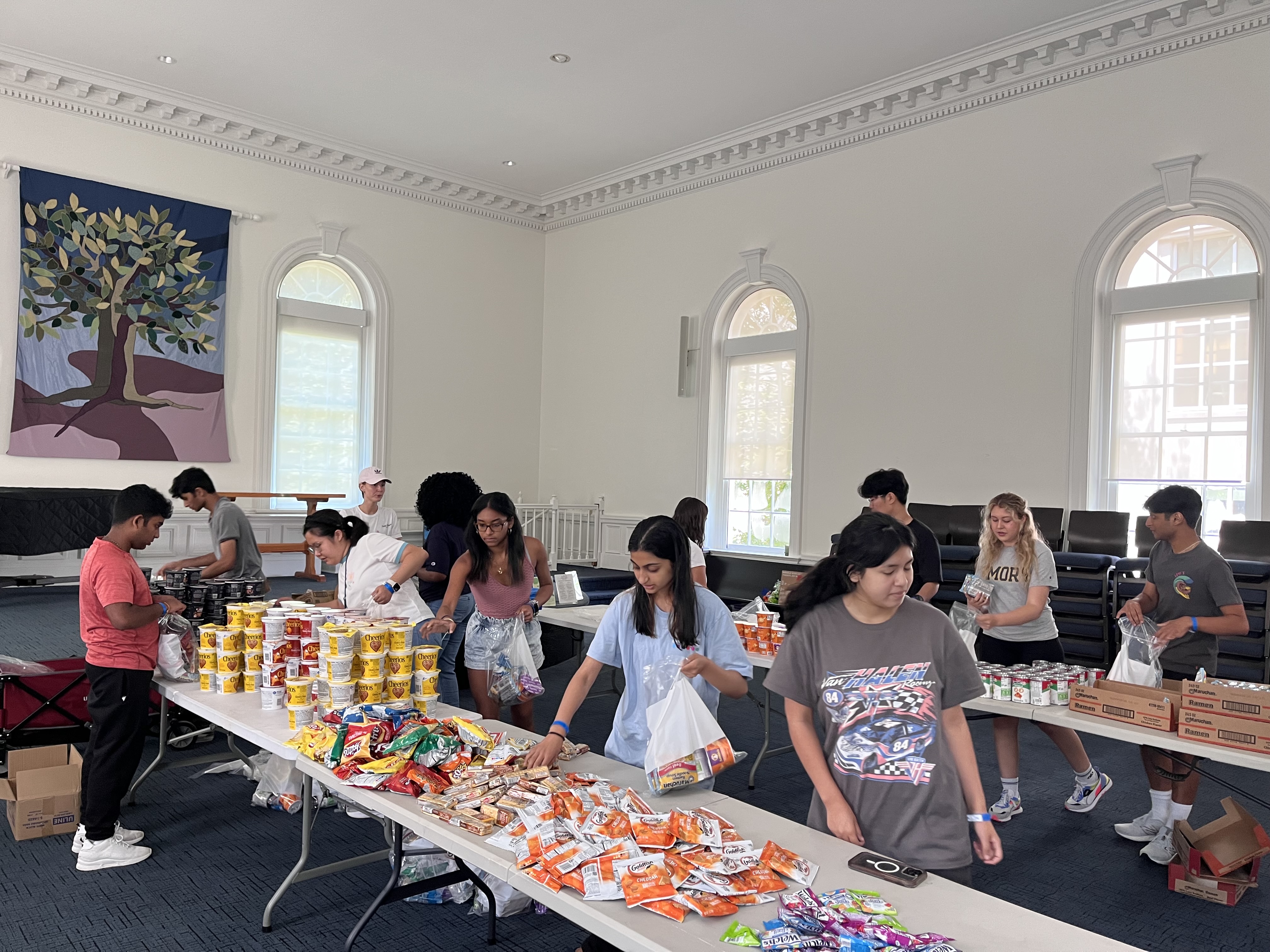 students packing food kits